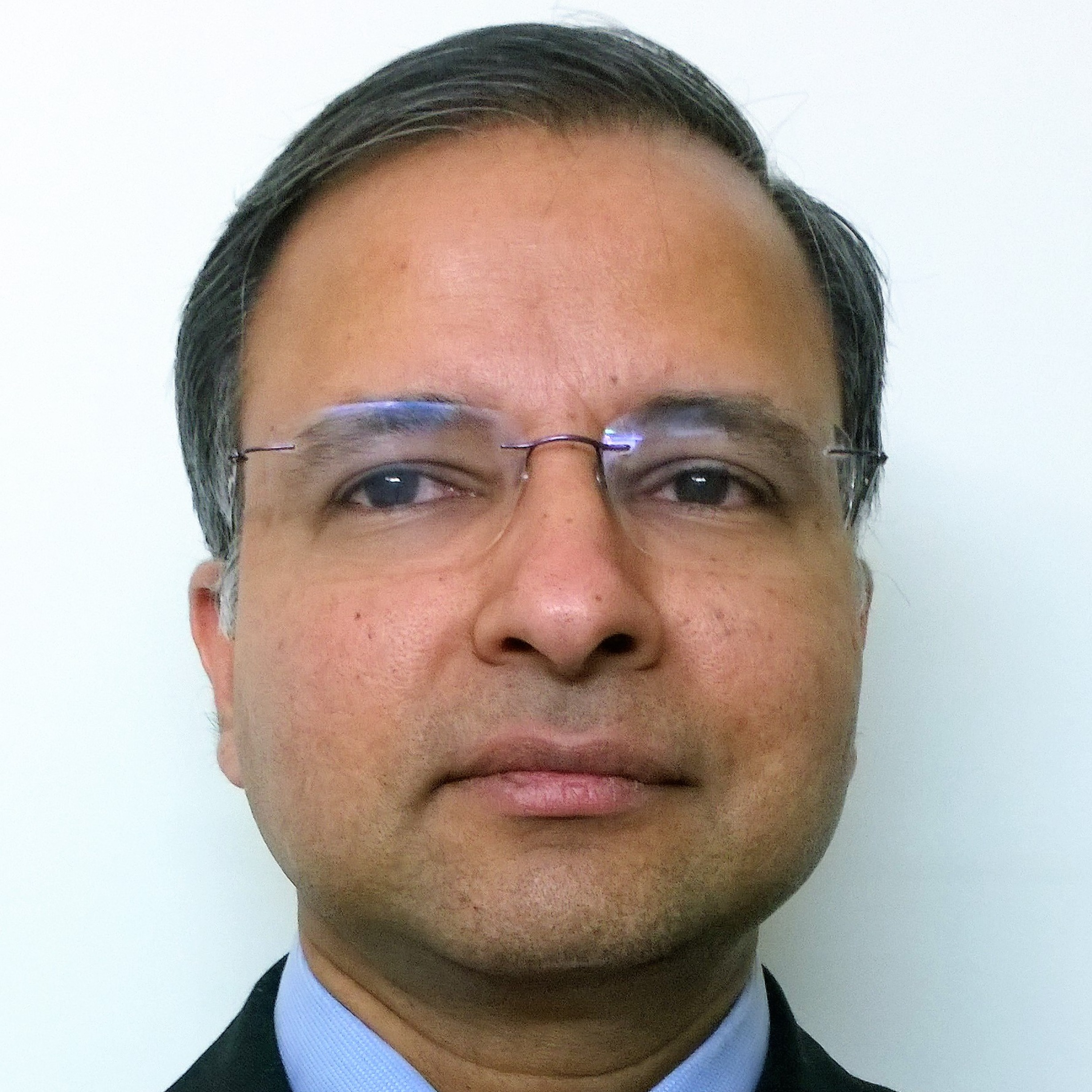 Dr. Ashok Menon